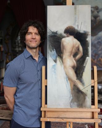 Shane Wolf in his studio with recent work
